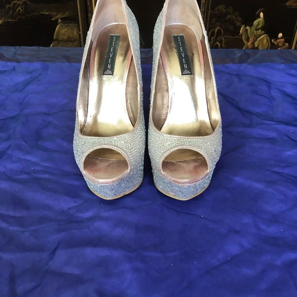Size 9.5 Steve Madden, rhinestone platform pumps.
